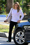 th_58580_Preppie_Hilary_Duff_at_the_voting_polling_place_6_122_147lo.jpg