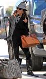 th_34144_celebrity_paradise.com_TheElder_EvaLongoria2011_03_25_arrivingatLAX15_122_472lo.jpg